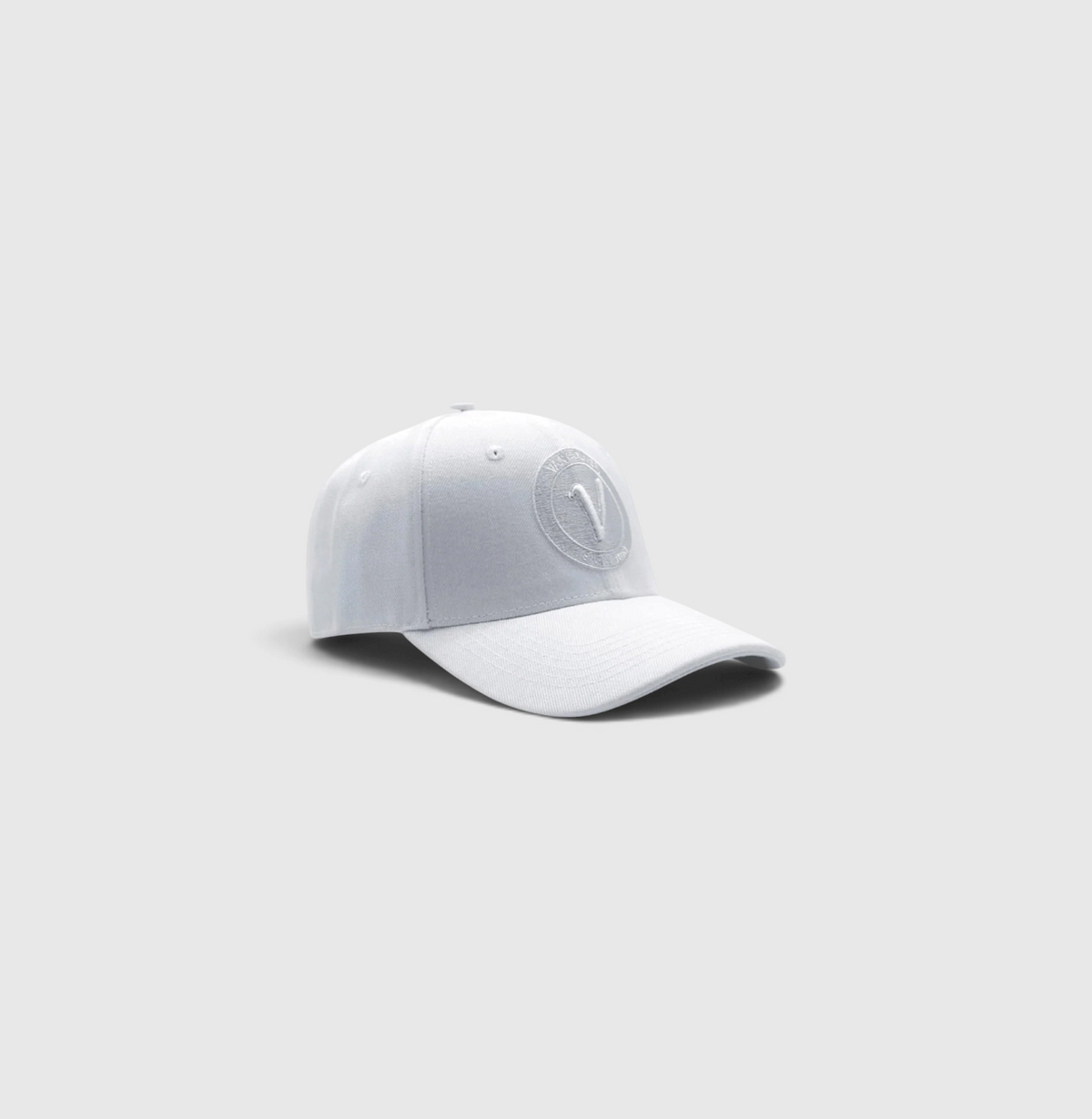 front view of the white on white First Up lifestyle adjustable hat by Vancouver Signature