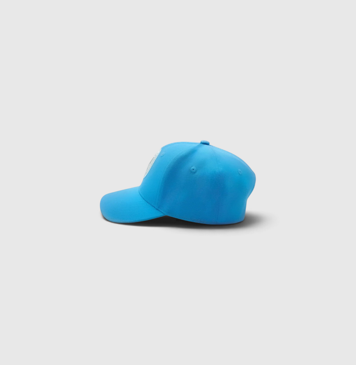 Side view of the lagoon and white Listo premium structured hat by Vancouver Signature