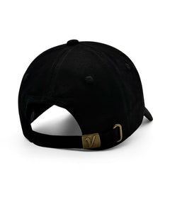 Rear view of the black and white Elation cotton hat showing the adjustable brass buckle strap