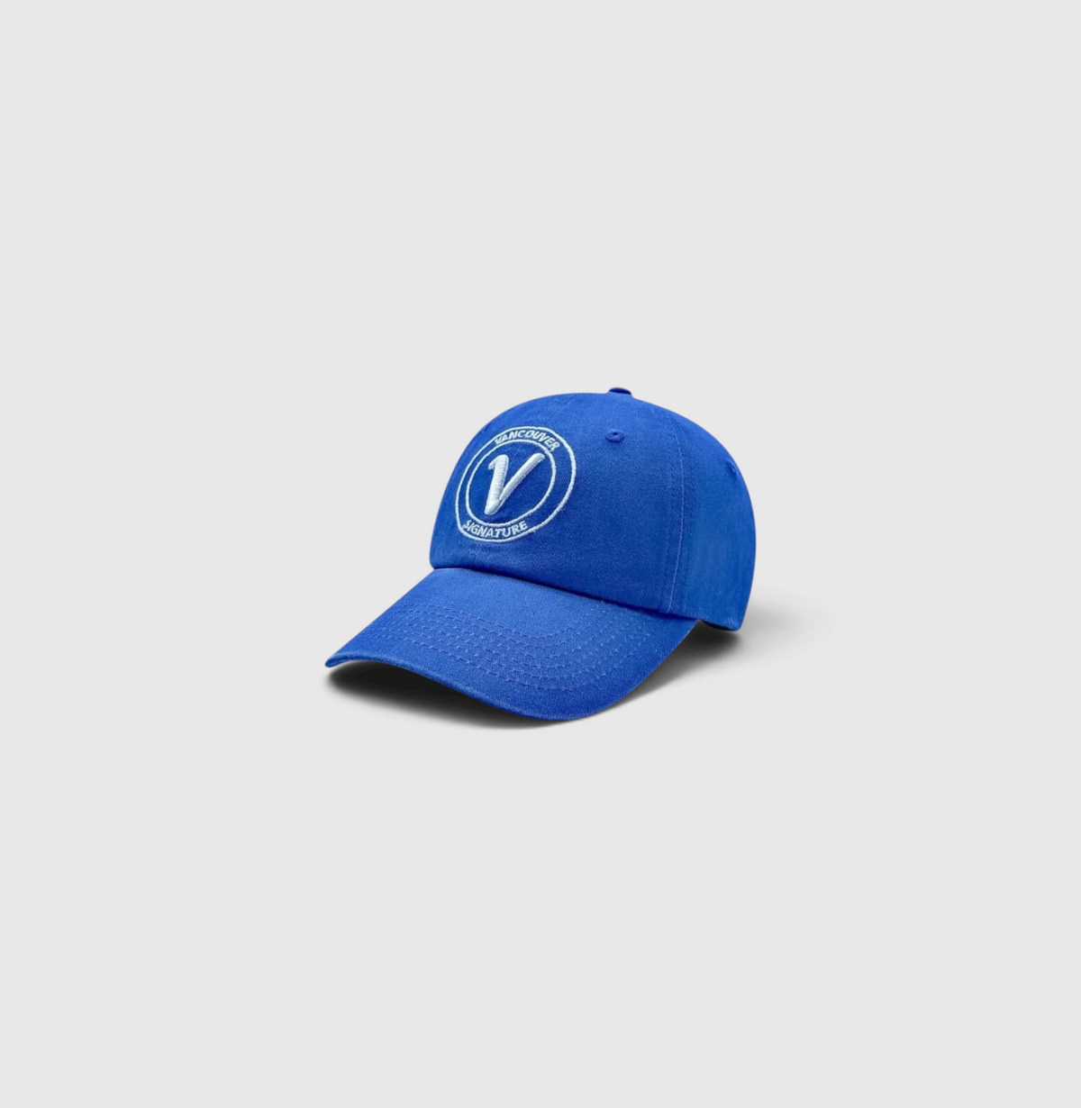 Front view of the pacific and white Elation relaxed-fit cotton hat by Vancouver Signature.