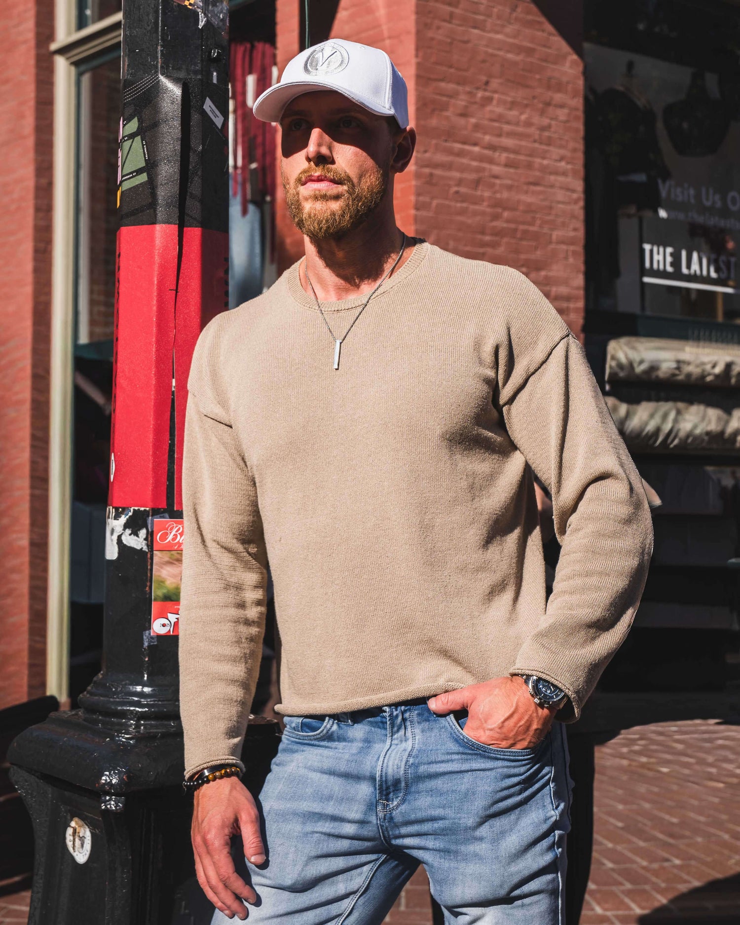 Man wearing Vancouver Signature First Up athleisure hat in white and white