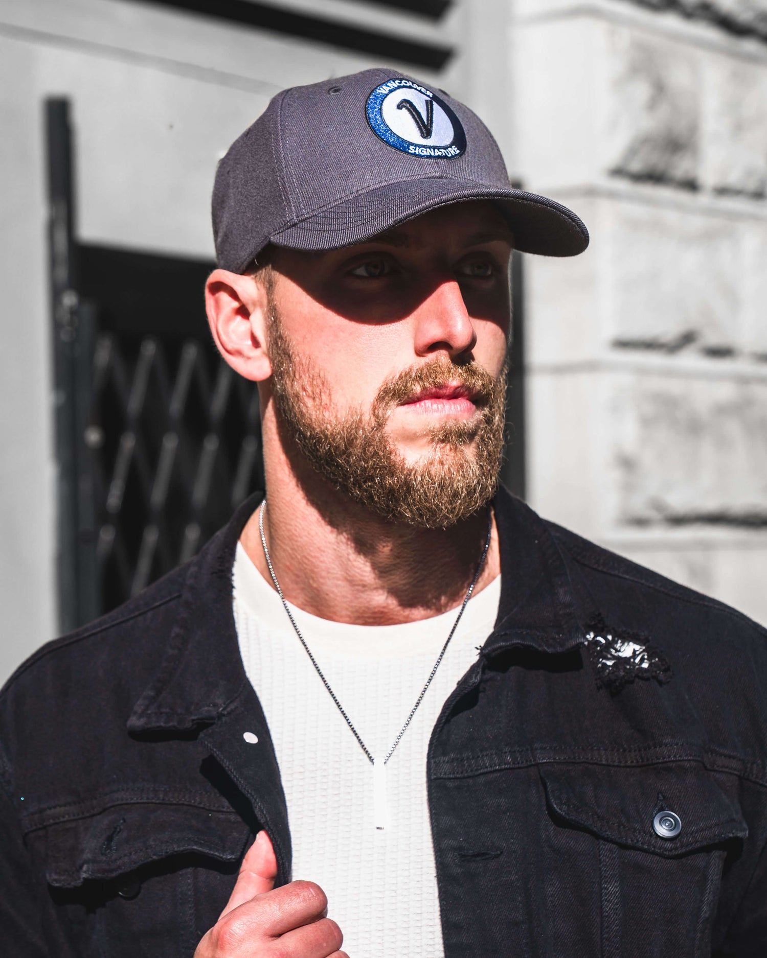 Model wearing a LISTO premium hat by Vancouver Signature