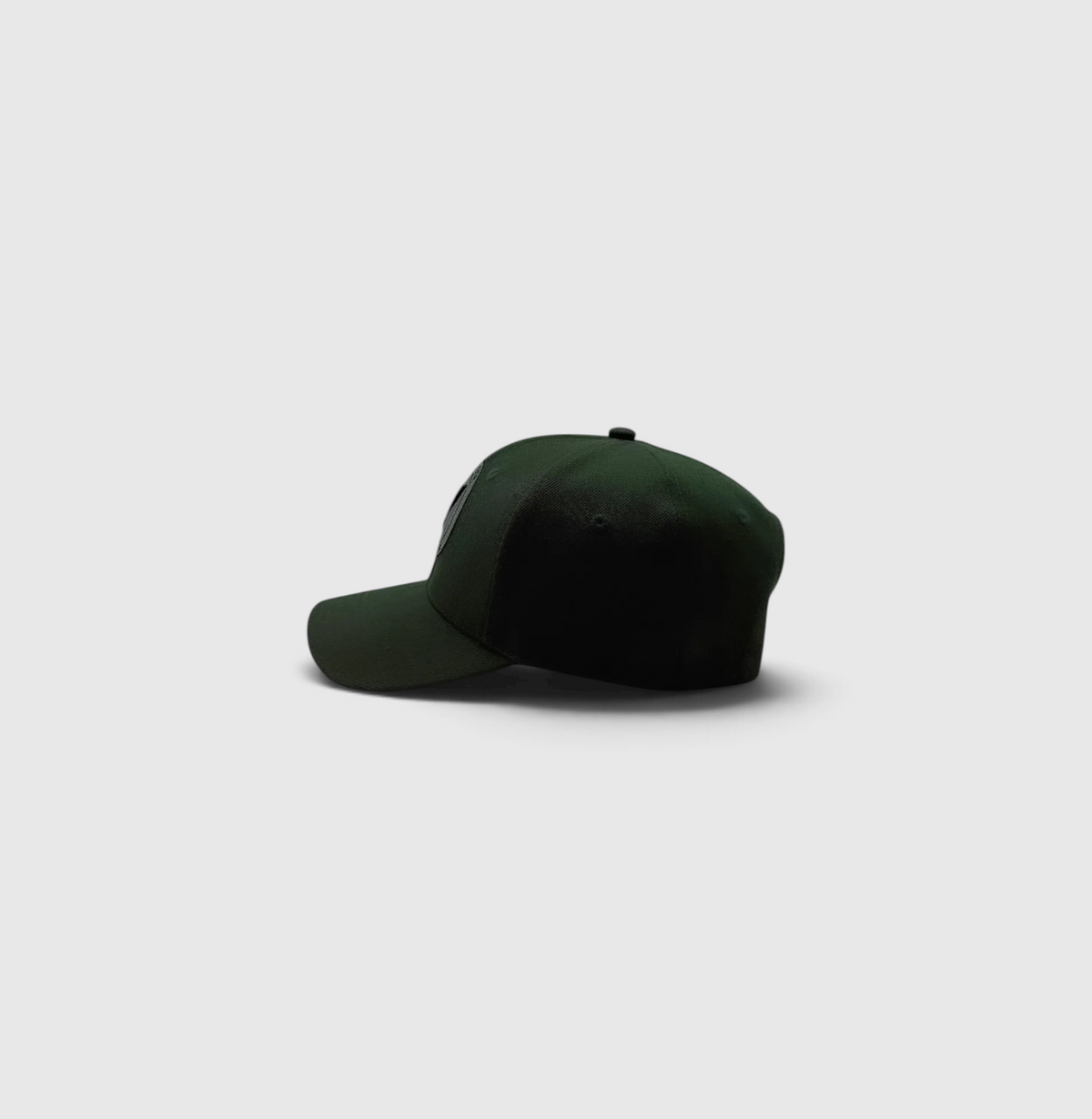 Side view of the canopy and black Listo premium structured hat by Vancouver Signature