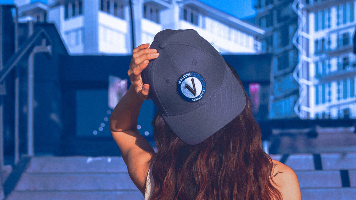 Model wearing a Vancouver Signature hat in Vancouver